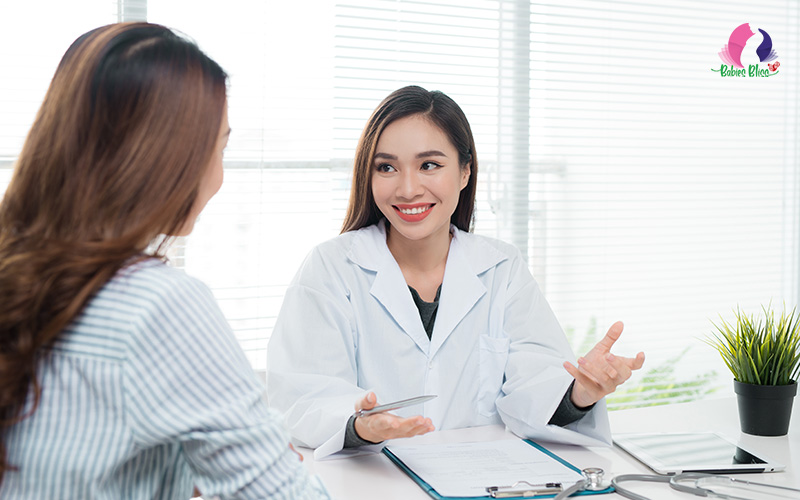 Women Patient Talking to Doctor